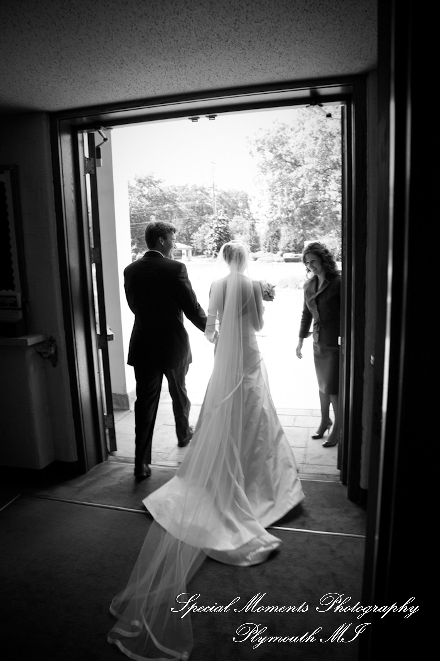 Jennifer & Jason at St. Kateri Tekakwitha Catholic Dearborn MI wedding photography