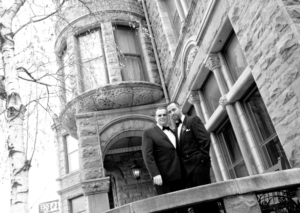 Nasir & Mark at The Whitney Restaurant Detroit LGBTQ wedding photograph