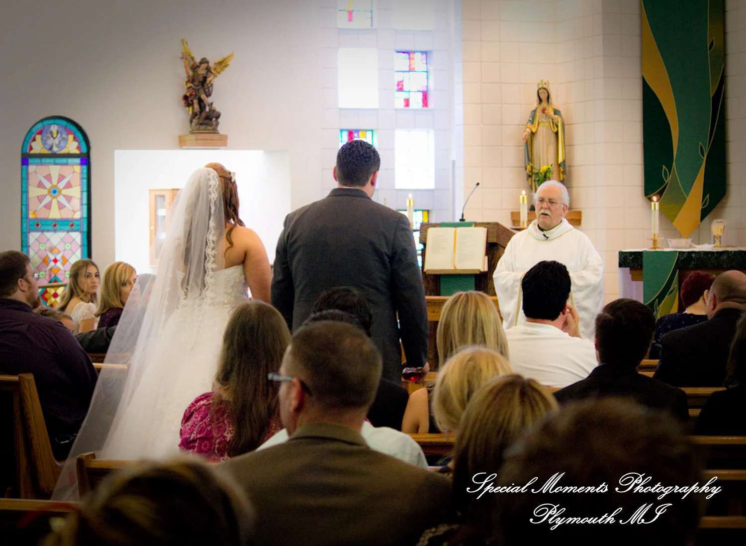 Holy Spirit Roman Catholic Brighton MI wedding photograph