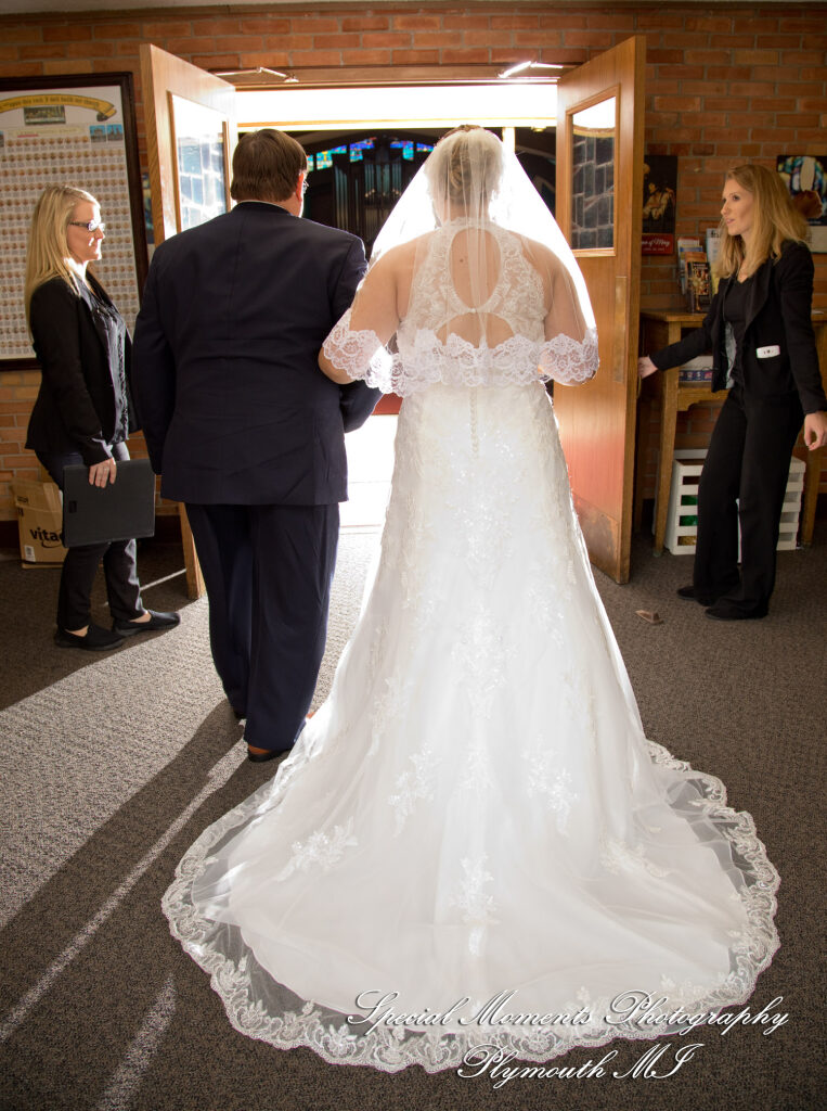 Marie & Steven at Holy Family Catholic Grand Blanc MI wedding photography