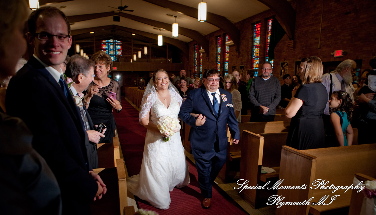 Marie & Steven at Holy Family Catholic Grand Blanc MI wedding photography