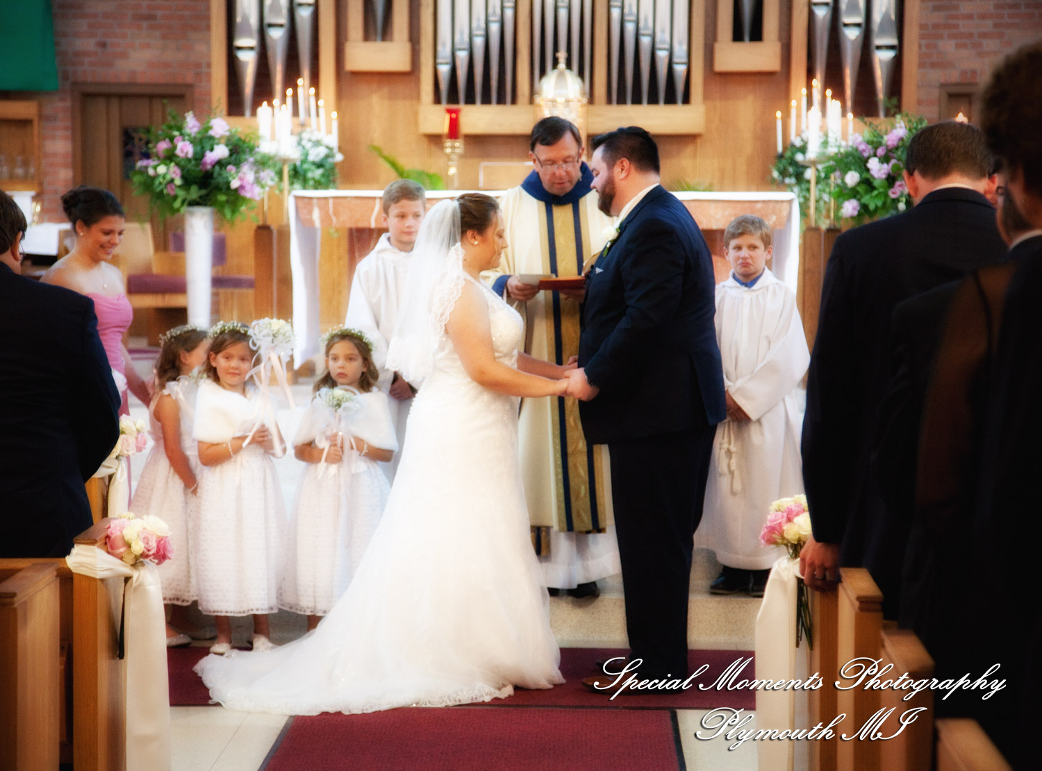 Marie & Steven at Holy Family Catholic Grand Blanc MI wedding photography
