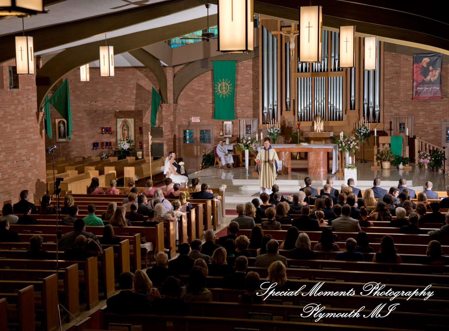 Marie & Steven at Holy Family Catholic Grand Blanc MI wedding photography