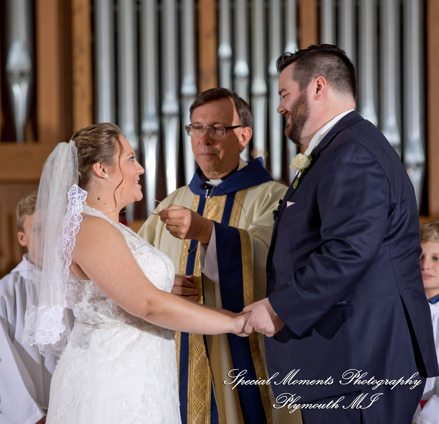 Marie & Steven at Holy Family Catholic Grand Blanc MI wedding photography