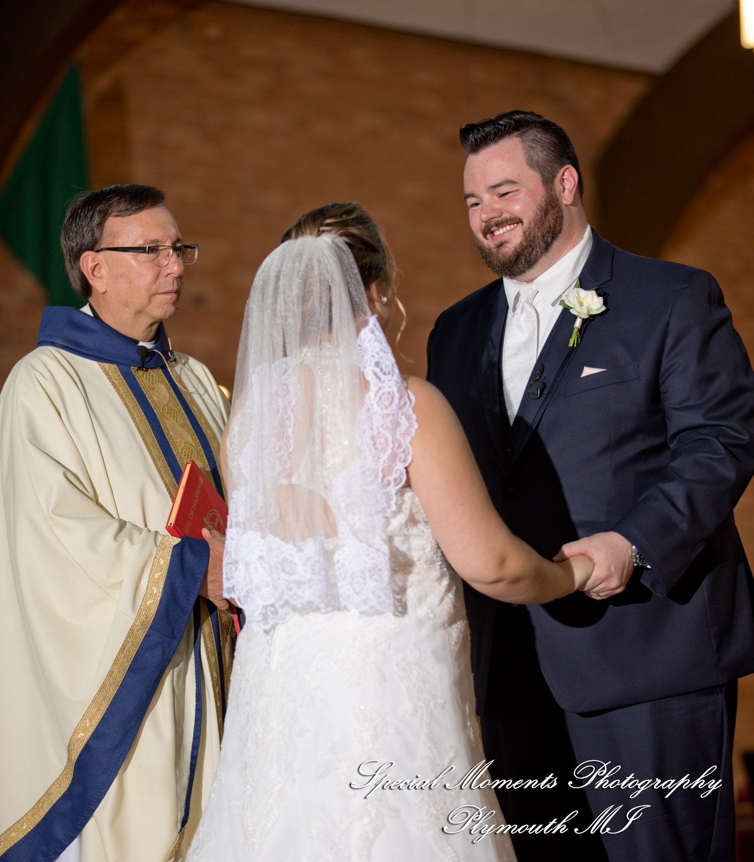 Marie & Steven at Holy Family Catholic Grand Blanc MI wedding photography