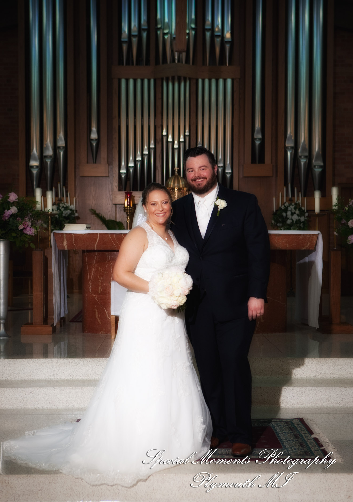 Marie & Steven at Holy Family Catholic Grand Blanc MI wedding photography