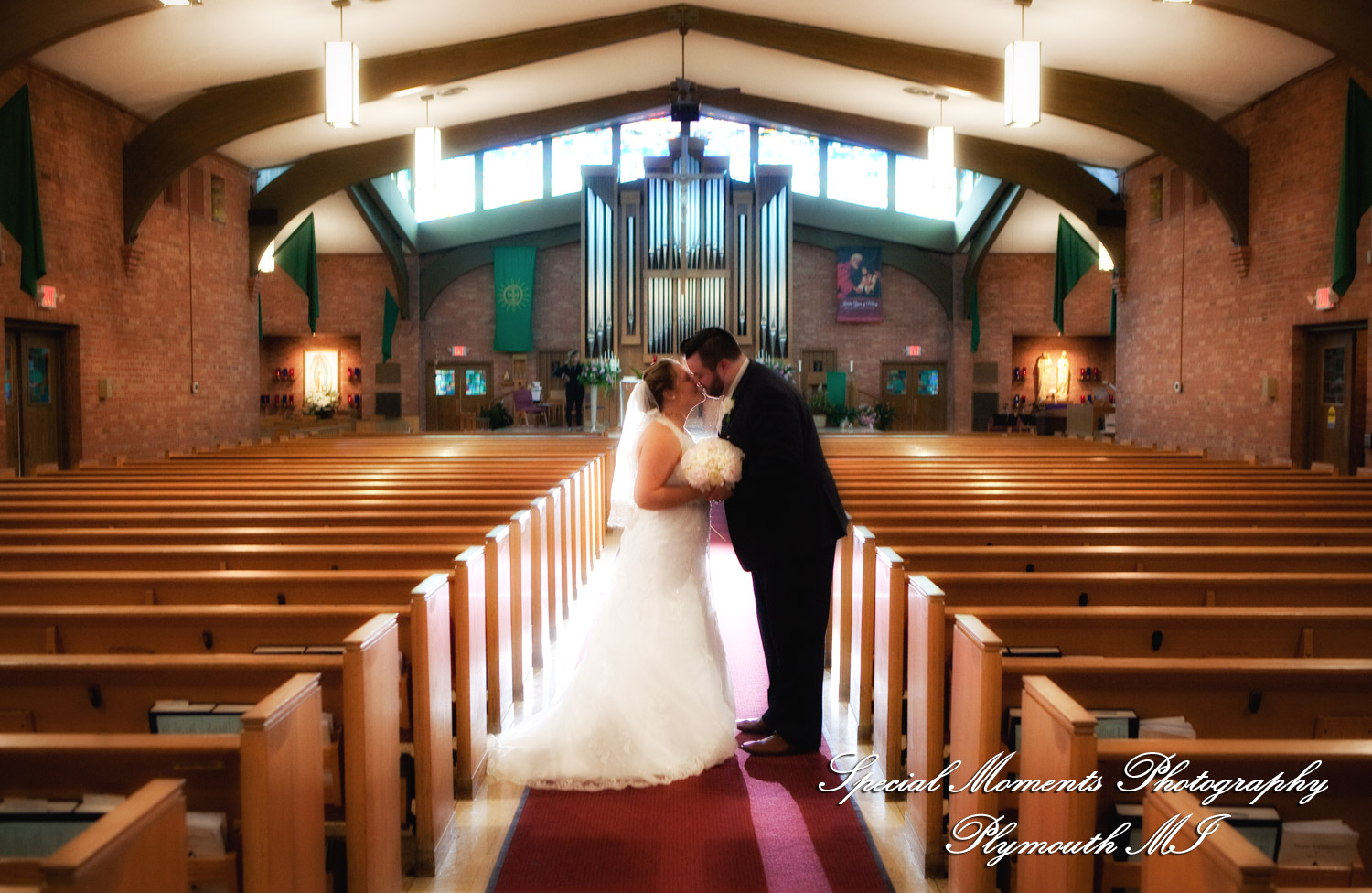 Marie & Steven at Holy Family Catholic Grand Blanc MI wedding photography