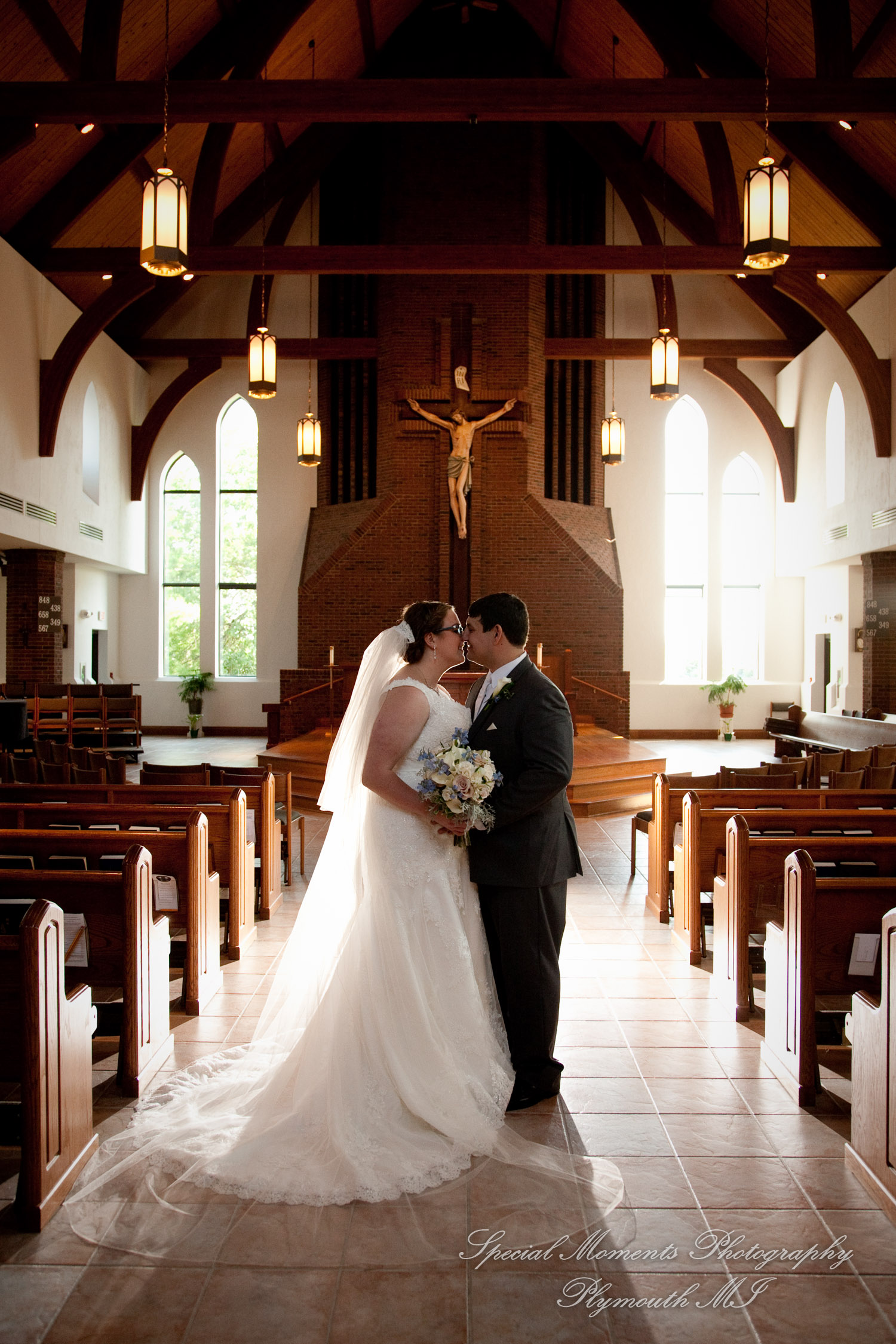 Mary & Jarrett at St. Andrew Catholic Church Saline MI wedding photography