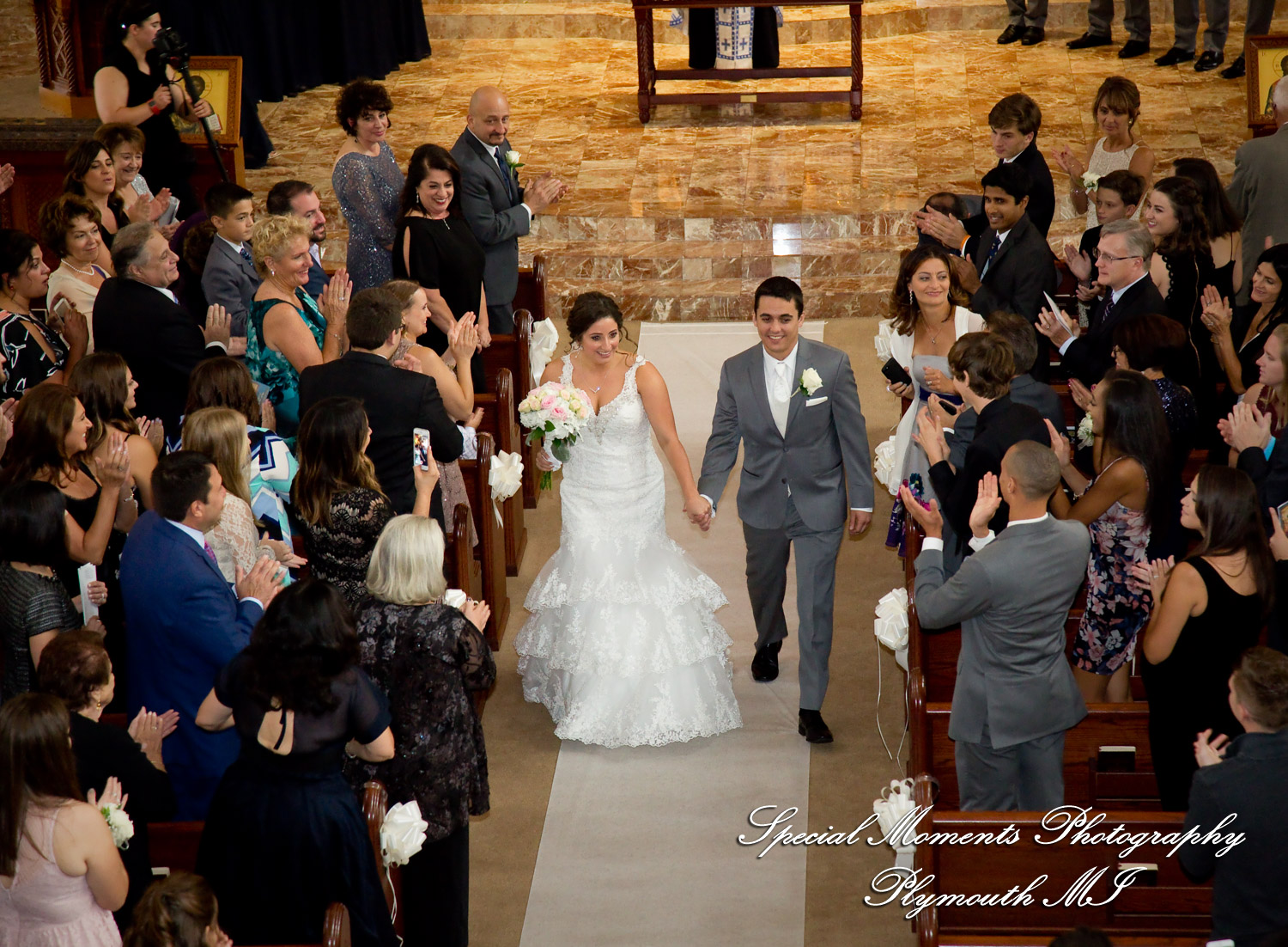 David & Steph at St. John Greek Orthodox Sterling Hts MI wedding photograph