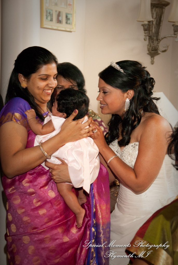 Sean & Bin at St. Joseph Lake Orion MI wedding photograph