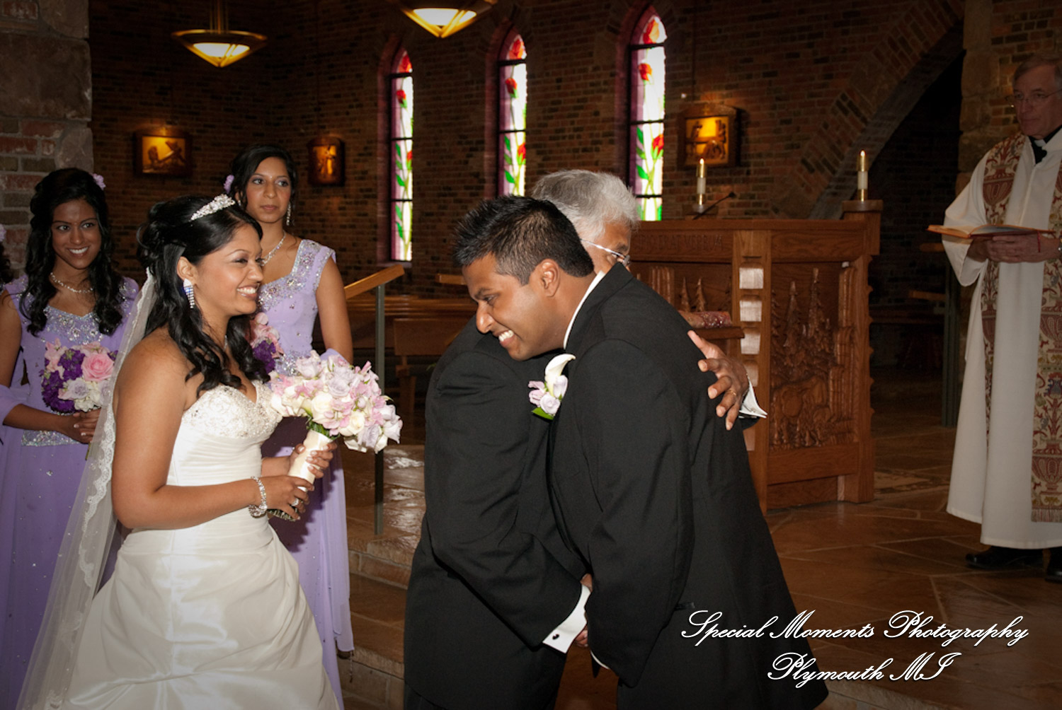 Sean & Bin at St. Joseph Lake Orion MI wedding photograph