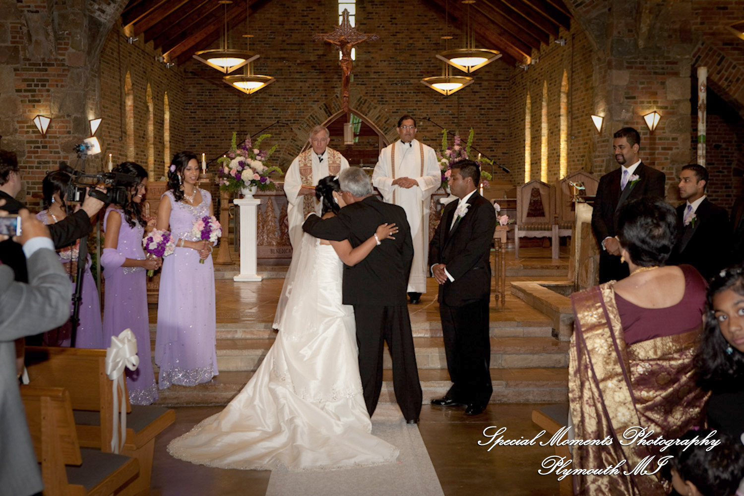 Sean & Bin at St. Joseph Lake Orion MI wedding photograph