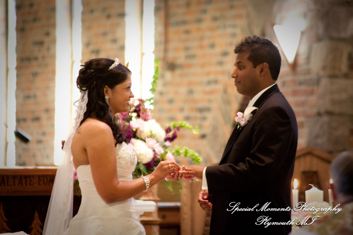 Sean & Bin at St. Joseph Lake Orion MI wedding photograph