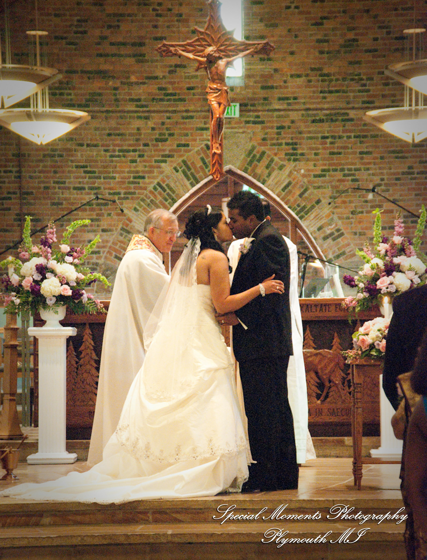 Sean & Bin at St. Joseph Lake Orion MI wedding photograph