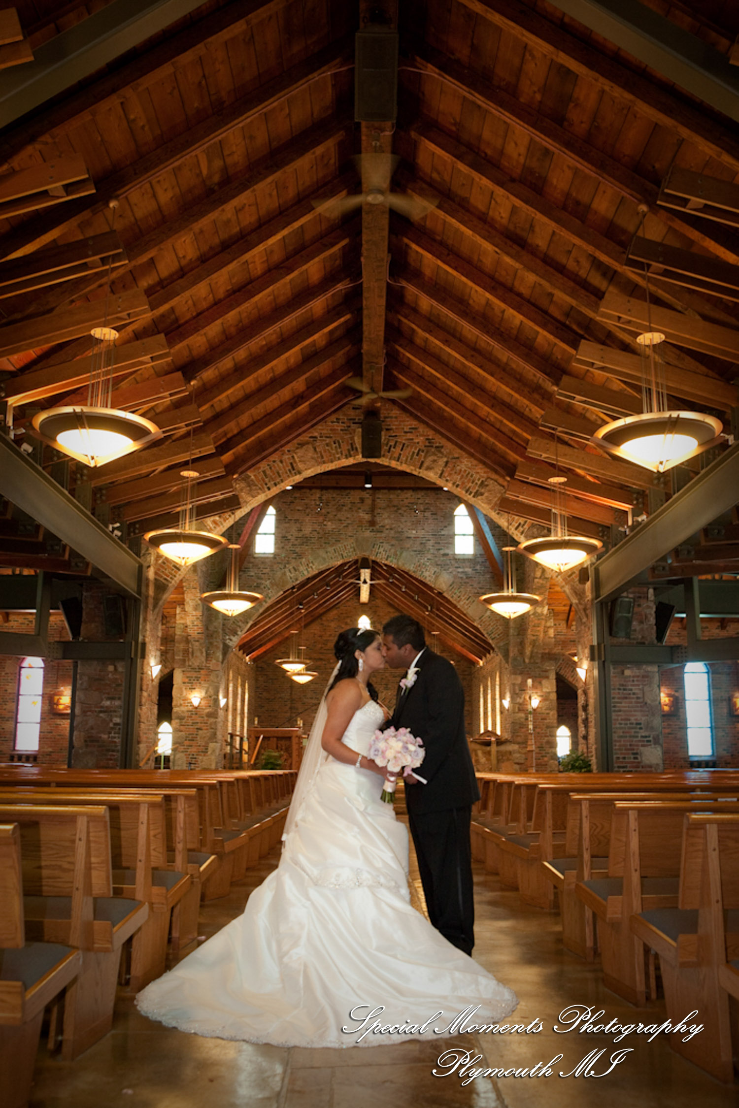 Sean & Bin at St. Joseph Lake Orion MI wedding photograph