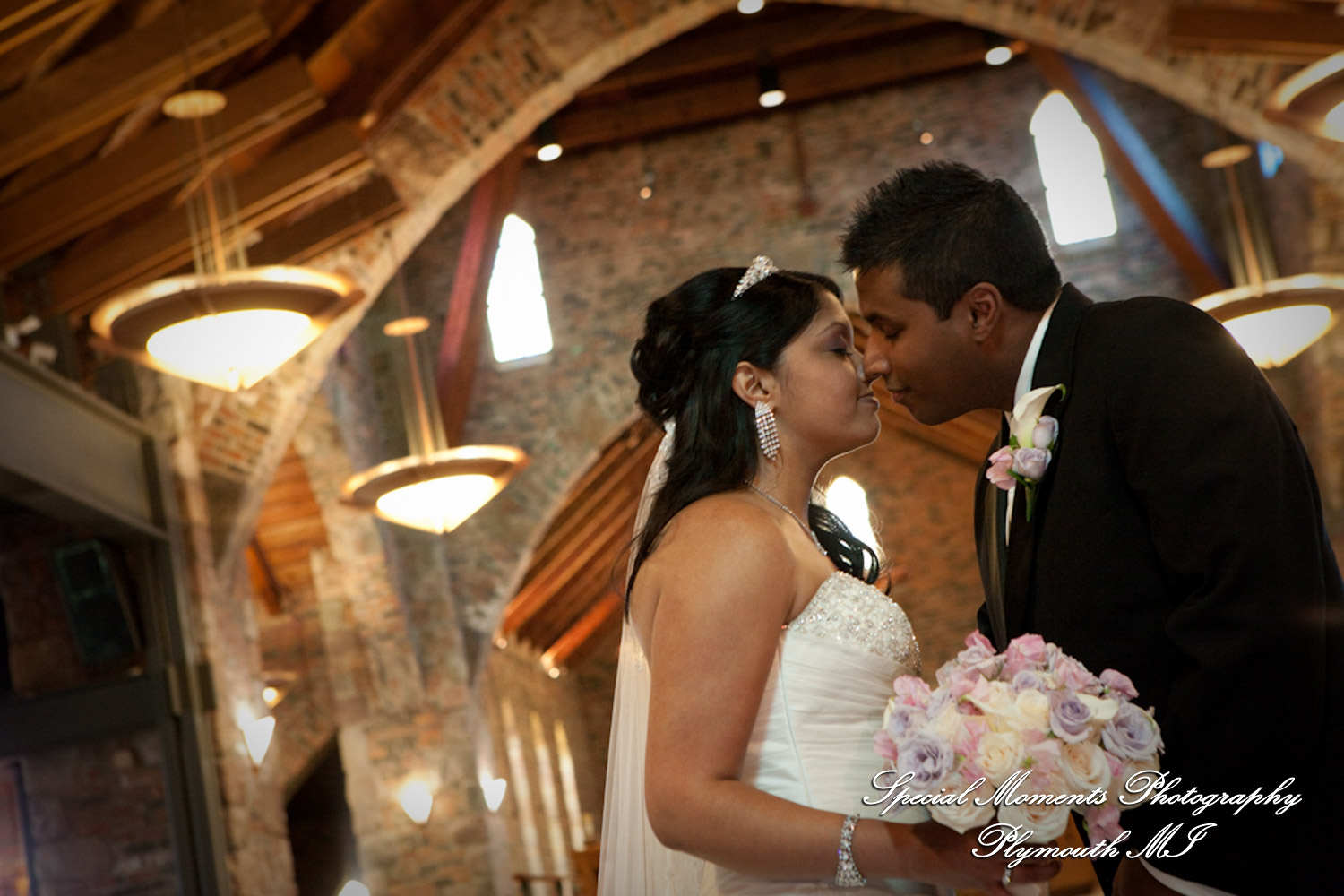 Sean & Bin at St. Joseph Lake Orion MI wedding photograph