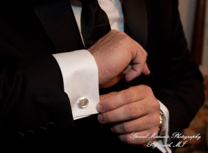 The couple at home getting ready wedding photograph