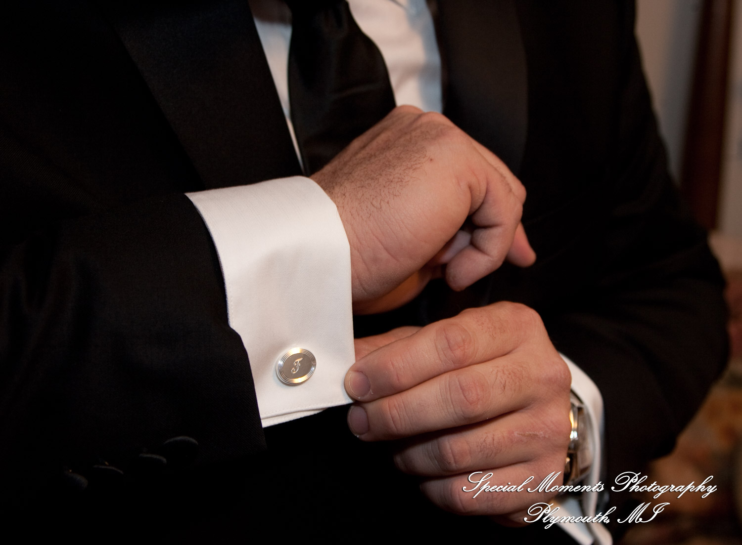 The couple at home getting ready wedding photograph