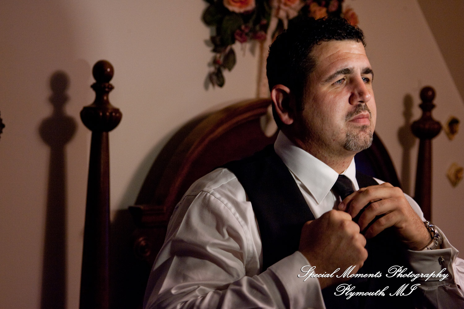 The couple at home getting ready wedding photograph