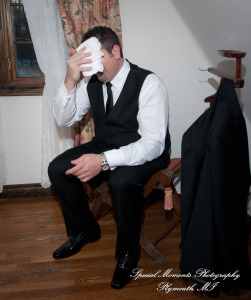 The couple at home getting ready wedding photograph