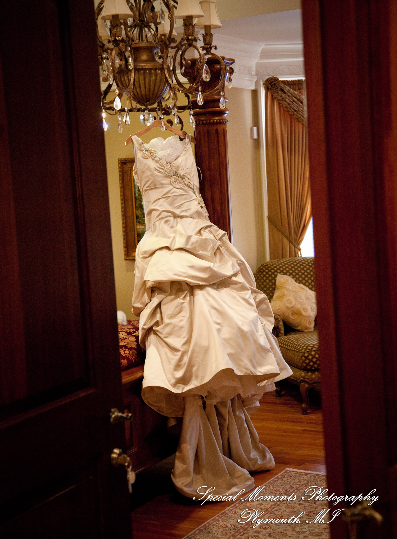 The couple at home getting ready wedding photograph