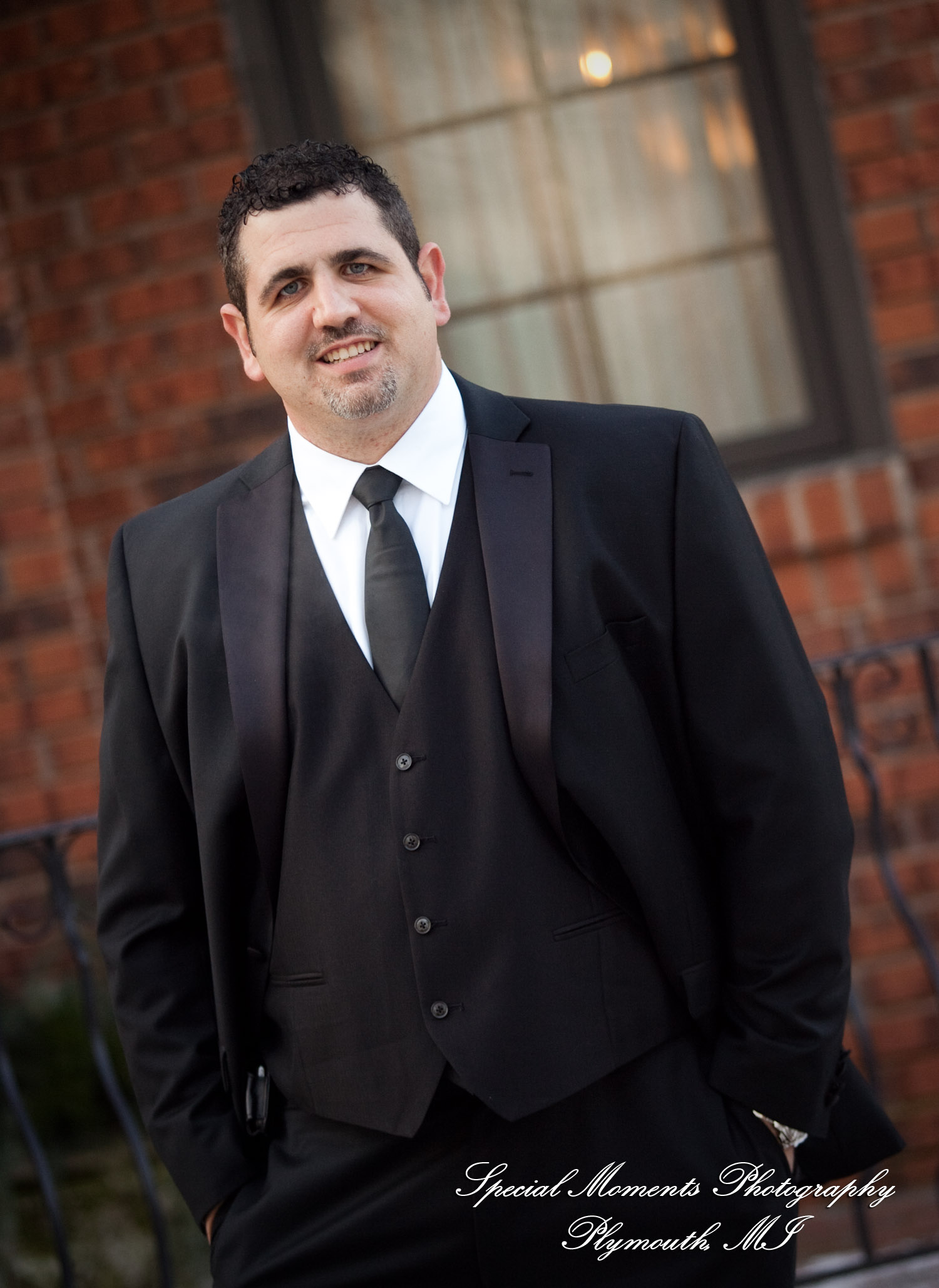 The couple at home getting ready wedding photograph