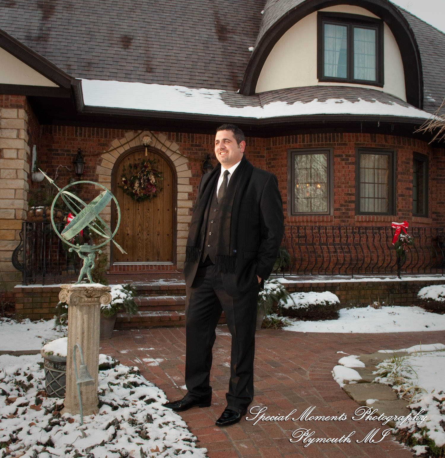 The couple at home getting ready wedding photograph