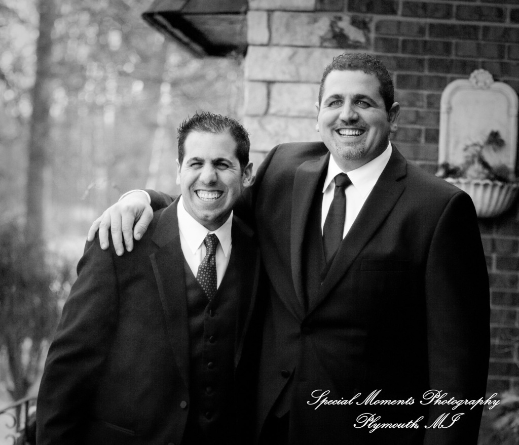 The couple at home getting ready wedding photograph