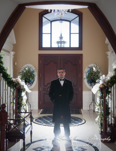 The couple at home getting ready wedding photograph