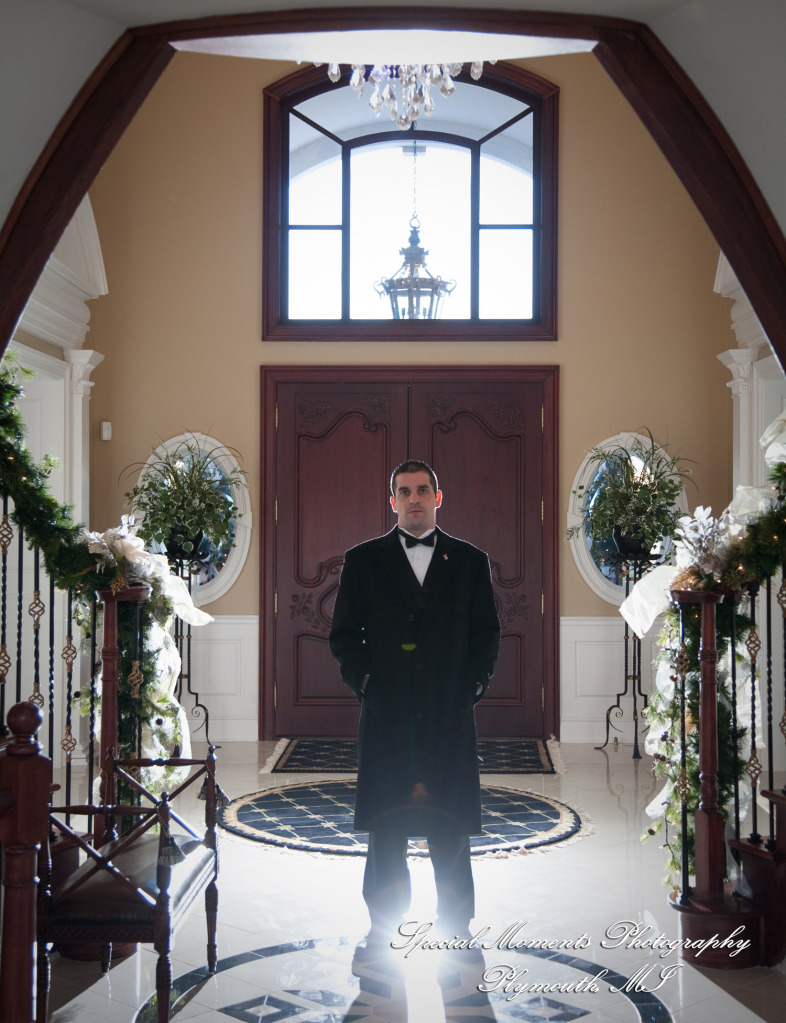 The couple at home getting ready wedding photograph