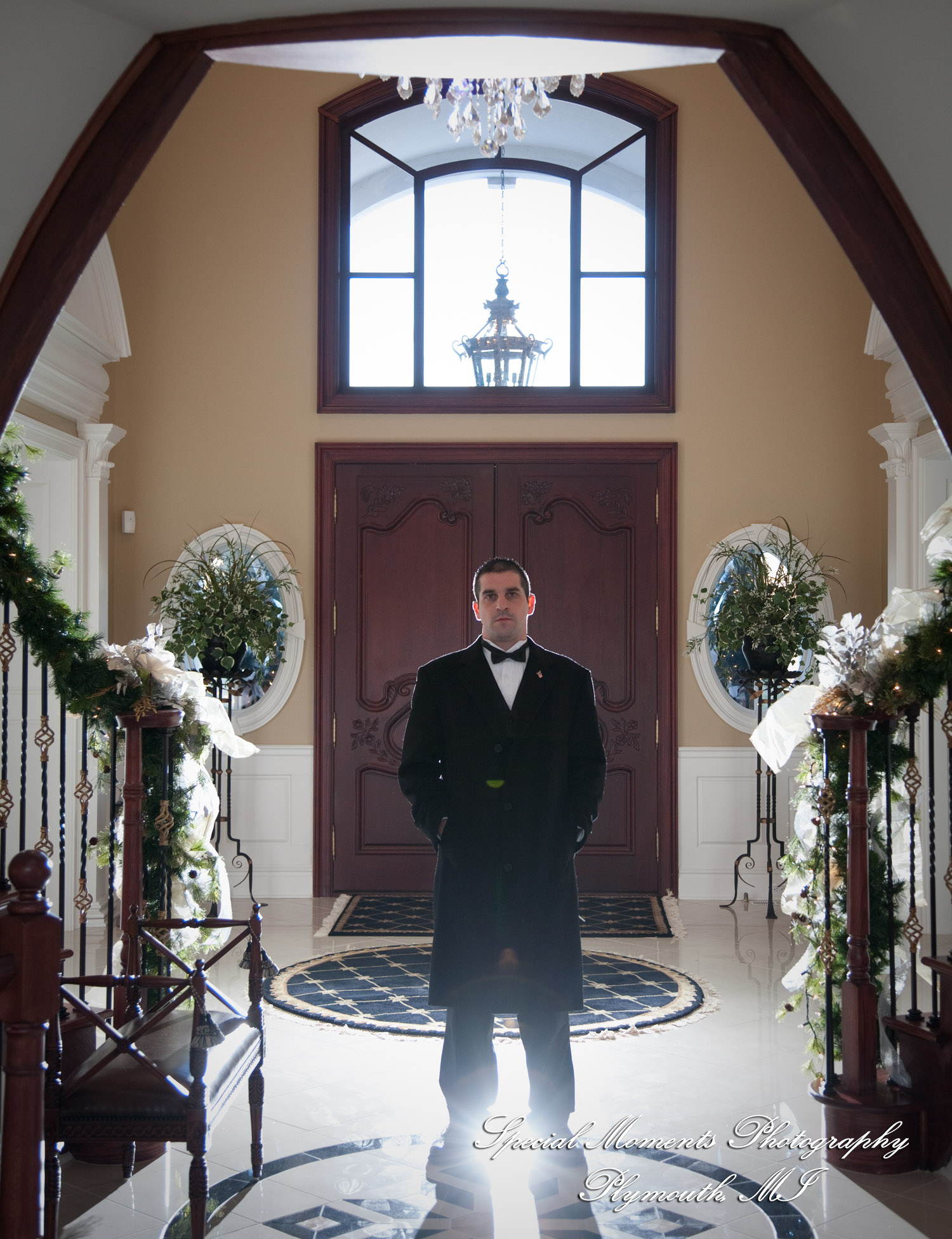 The couple at home getting ready wedding photograph