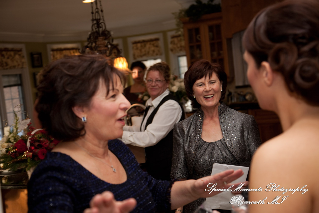 The couple at home getting ready wedding photograph