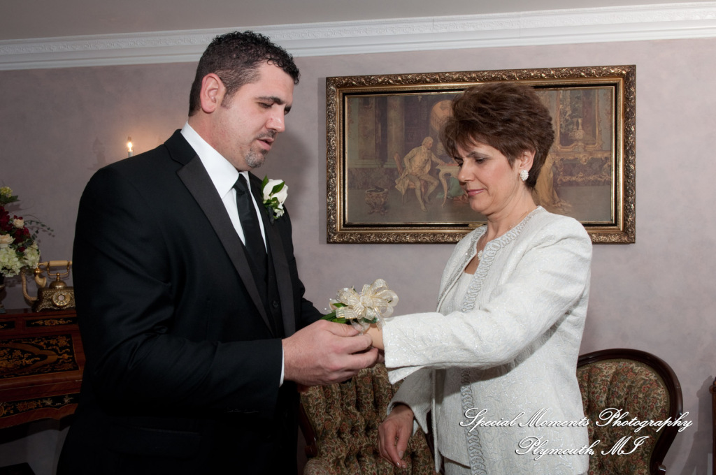 The couple at home getting ready wedding photograph
