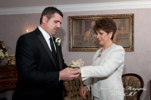 The couple at home getting ready wedding photograph