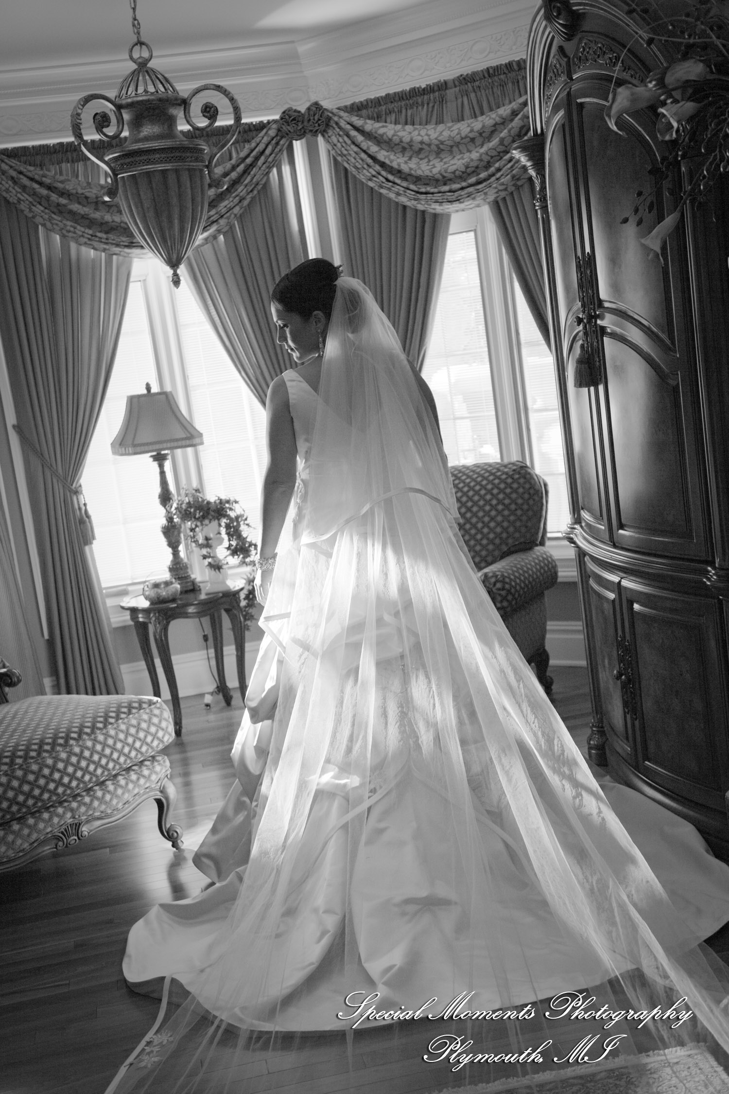 The couple at home getting ready wedding photograph