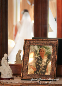 The couple at home getting ready wedding photograph