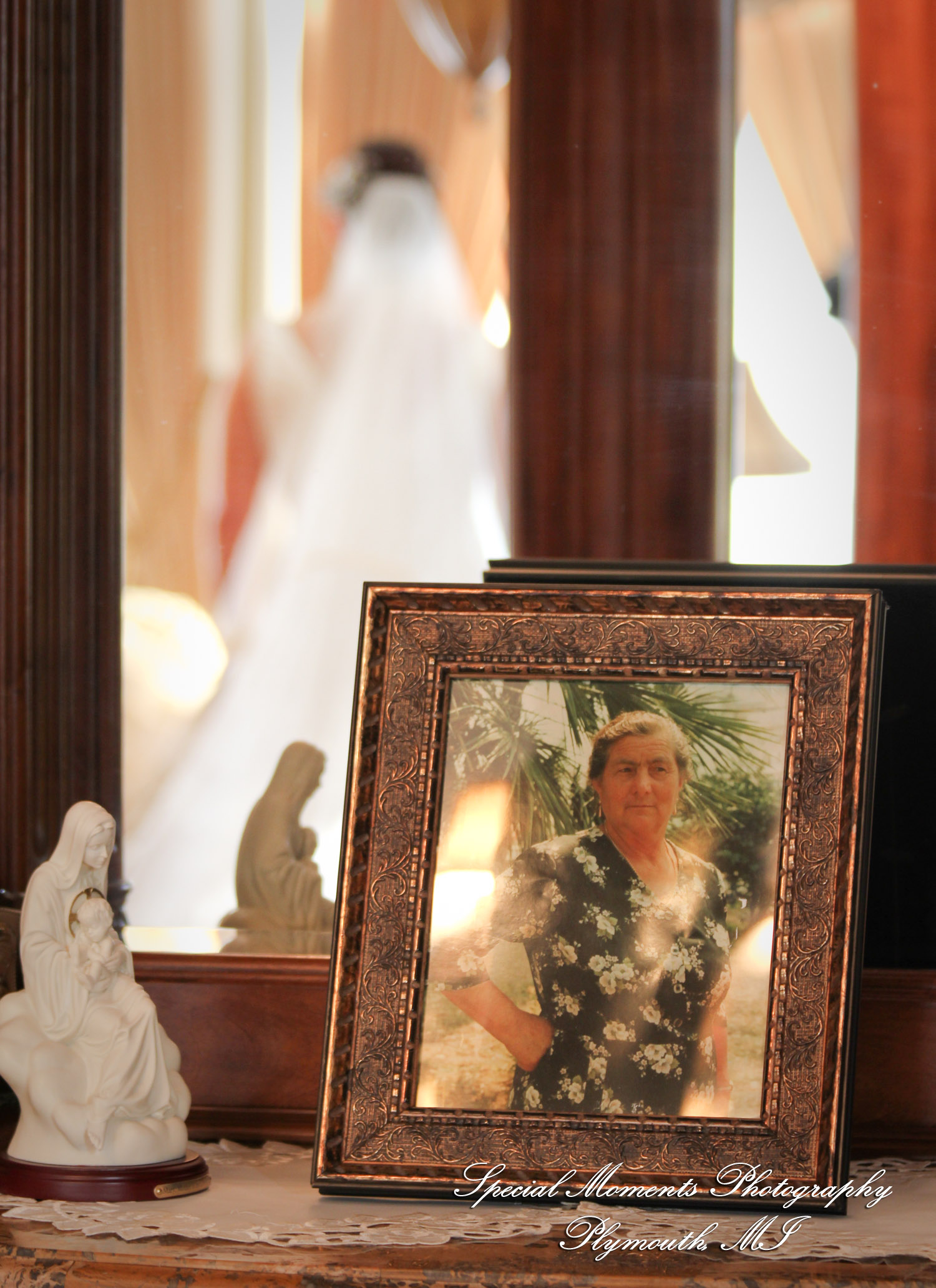 The couple at home getting ready wedding photograph