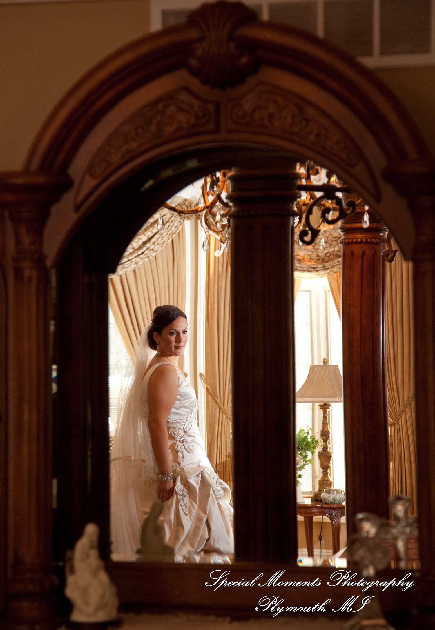 The couple at home getting ready wedding photograph