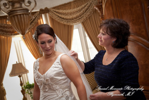 The couple at home getting ready wedding photograph