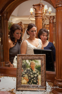 The couple at home getting ready wedding photograph