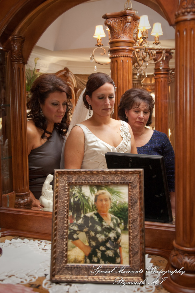 The couple at home getting ready wedding photograph