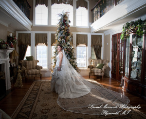 The couple at home getting ready wedding photograph