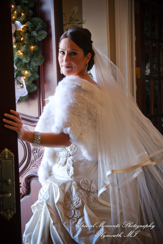 The couple at home getting ready wedding photograph