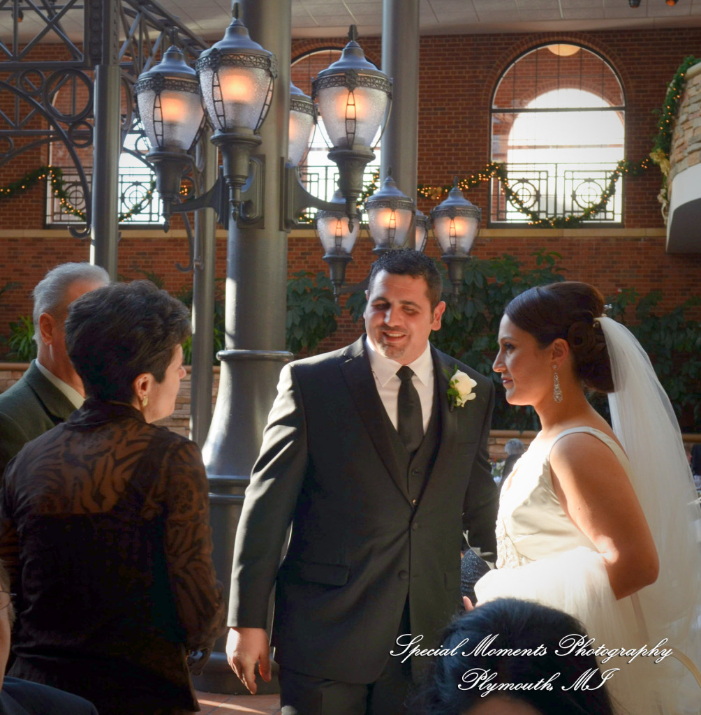 The couple at St. John's Resort Atrium Ballroom Plymouth MI wedding photograph