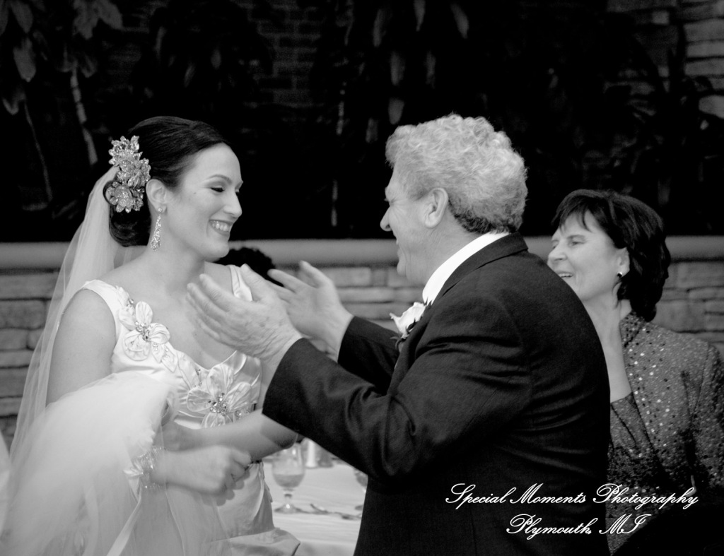 The couple at St. John's Resort Atrium Ballroom Plymouth MI wedding photograph