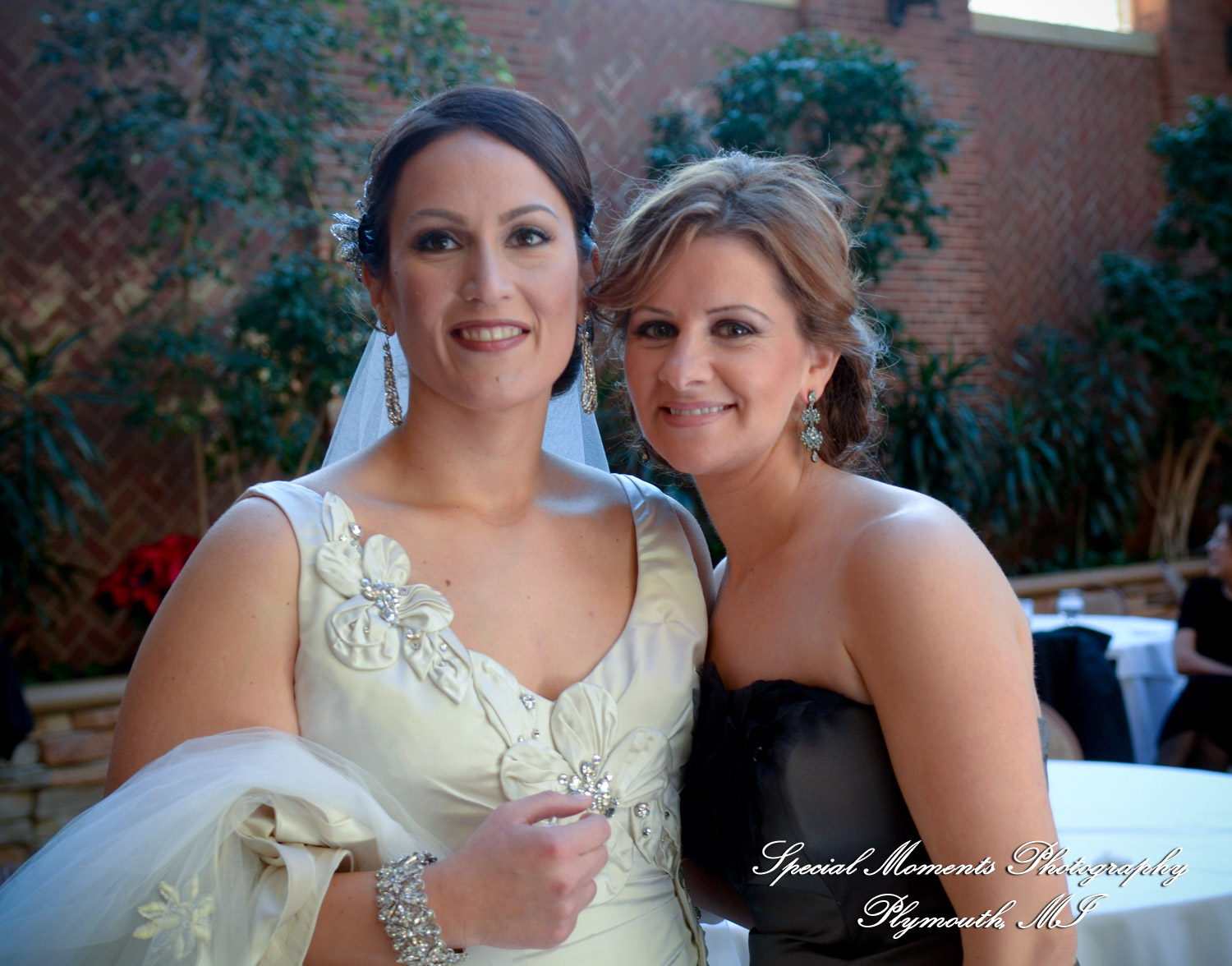 The couple at St. John's Resort Atrium Ballroom Plymouth MI wedding photograph