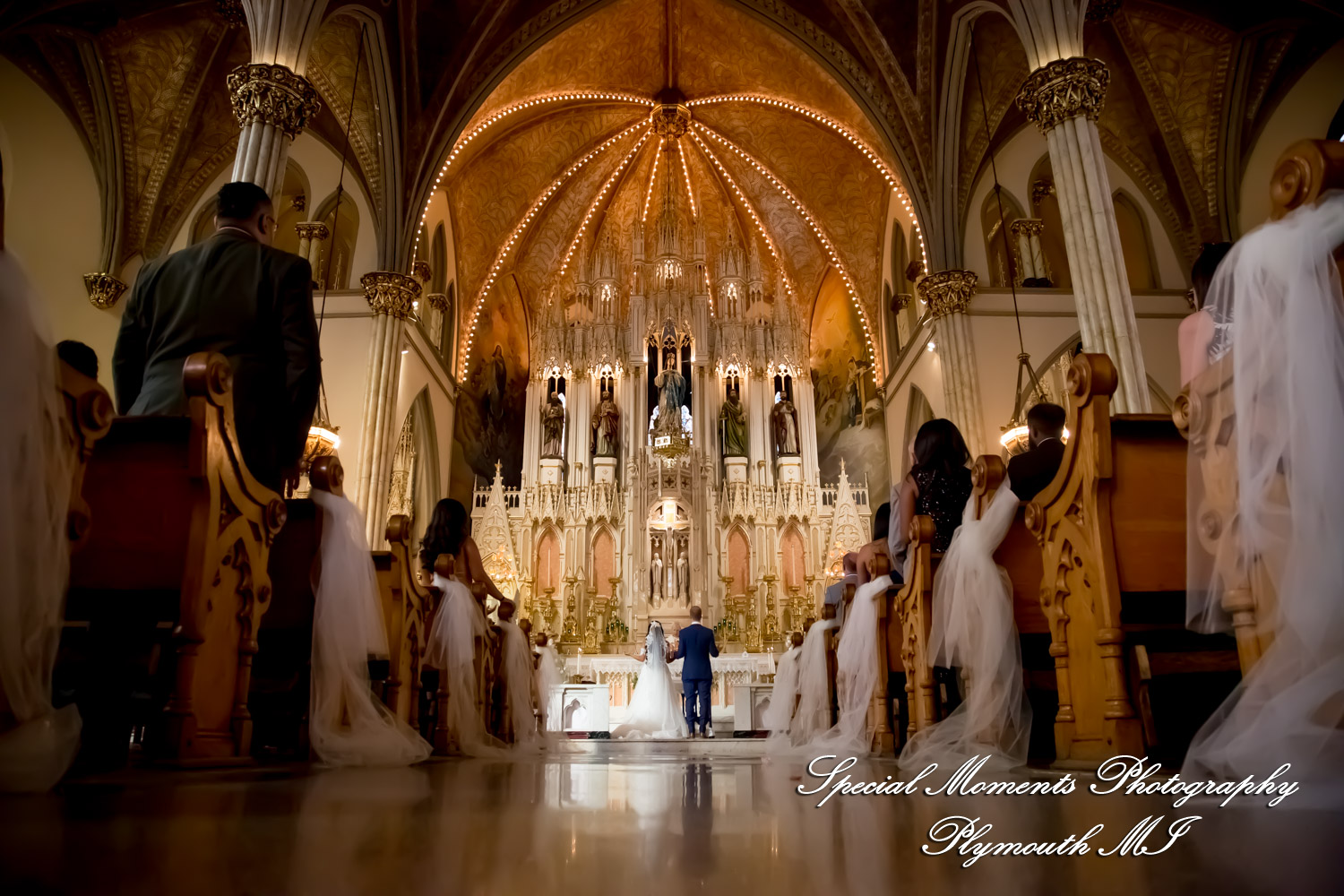 Heidy & Marcin at Sweetest Heart of Mary Church Detroit MI wedding photograph
