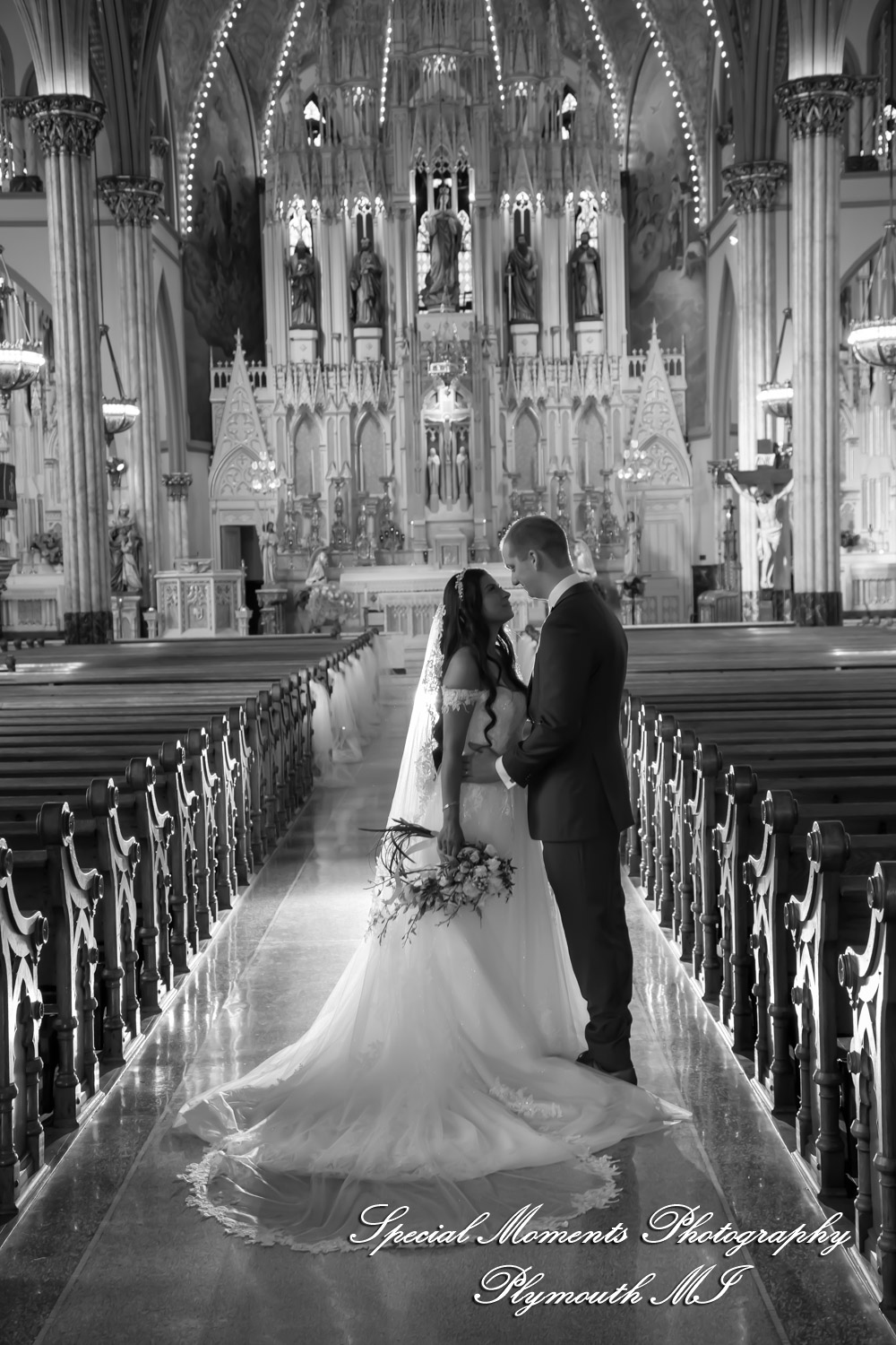 Heidy & Marcin at Sweetest Heart of Mary Church Detroit MI wedding photograph