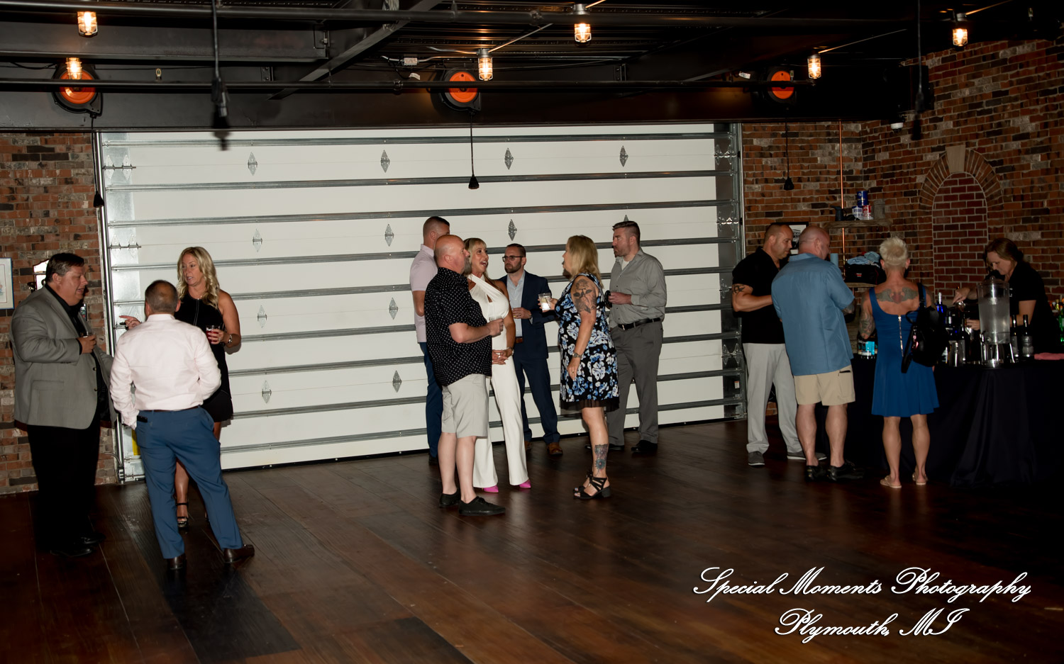 Laura & Mark at M1 Concourse Pontiac MI wedding photograph