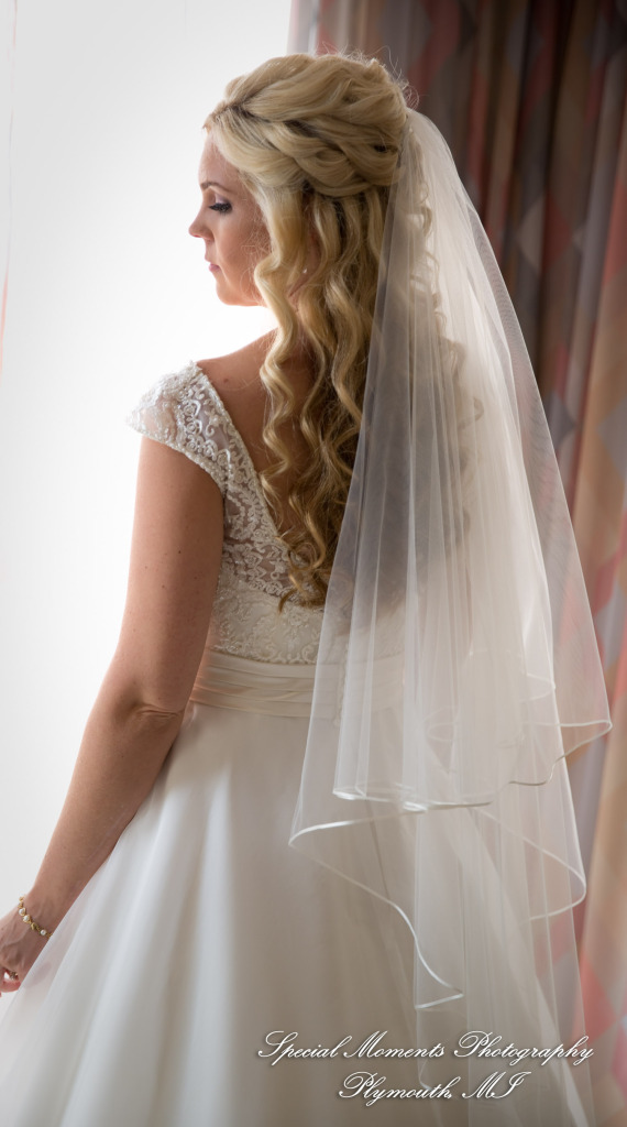 Kristin & Matthew at Embassy Suites by Hilton Livonia MI wedding photograph